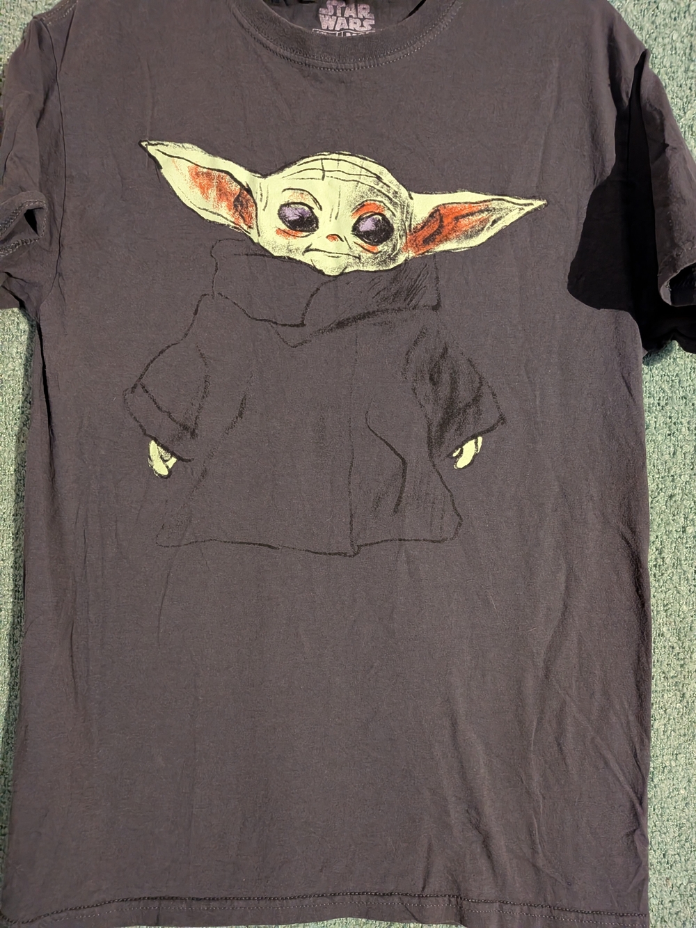 Star Wars Black Tee with Green and Orange Baby Yoda Illustration
